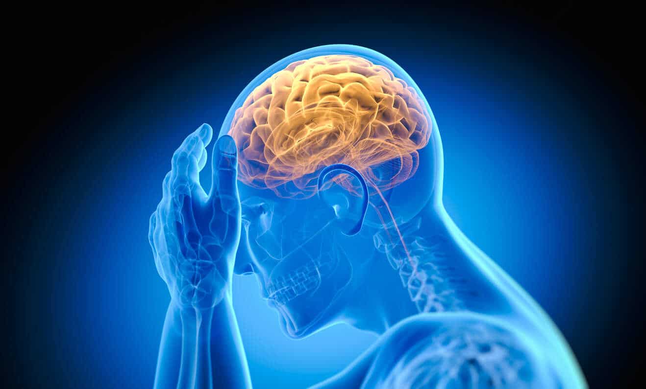 A glowing human brain within a translucent head model, illustrating a traumatic brain injury and its potential long-term effects.